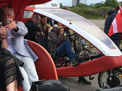 Price and info for ordering a bicycle taxi in Copenhagen for Company tour.